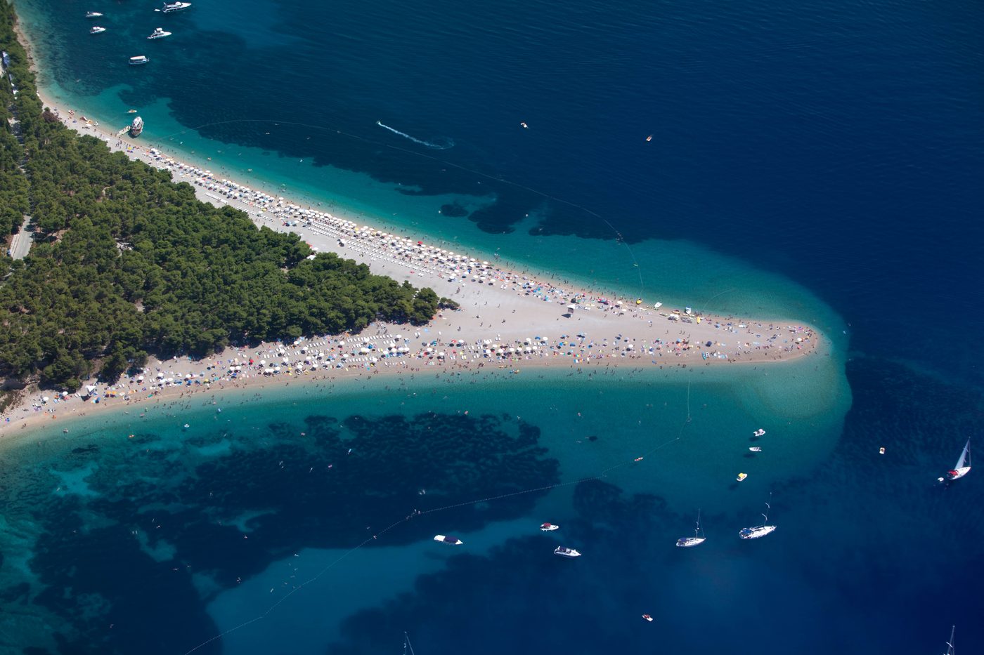 Zlatni Rat beach — the white pebble triangle near Bol on Brač