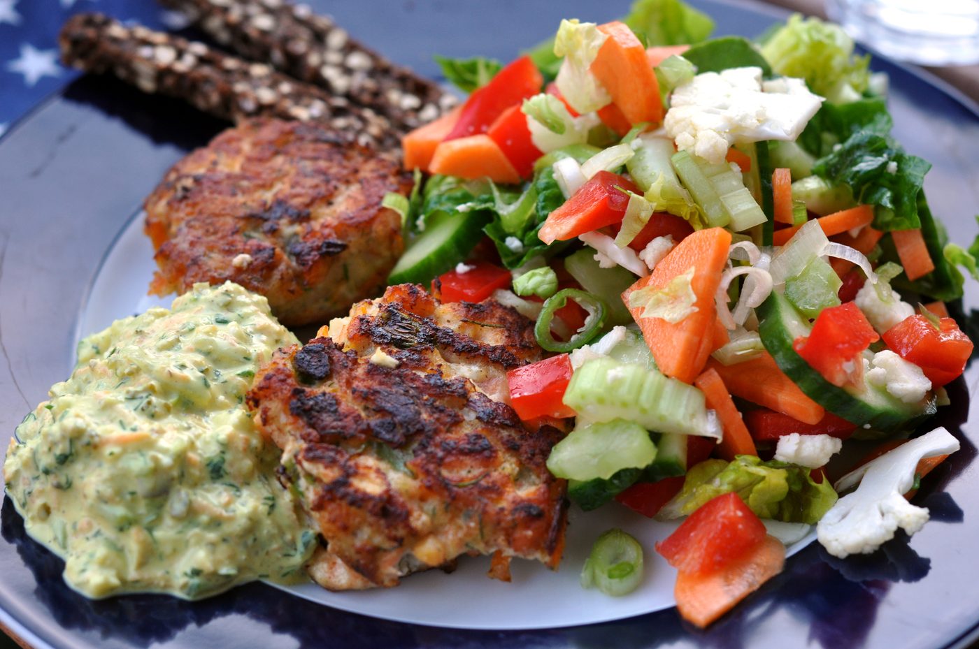 Danish rye bread (rugbrød) with grov remoulade, fish meatballs and salad