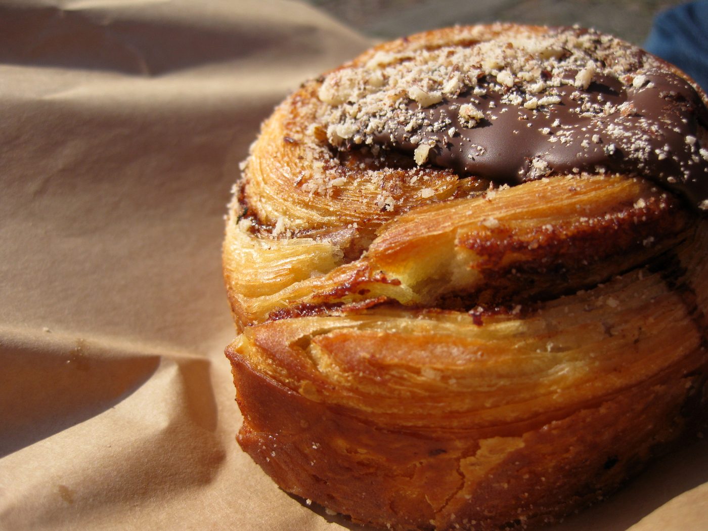 Kanelsnegl (Danish cinnamon Danish pastry) on a plate in a Copenhagen café