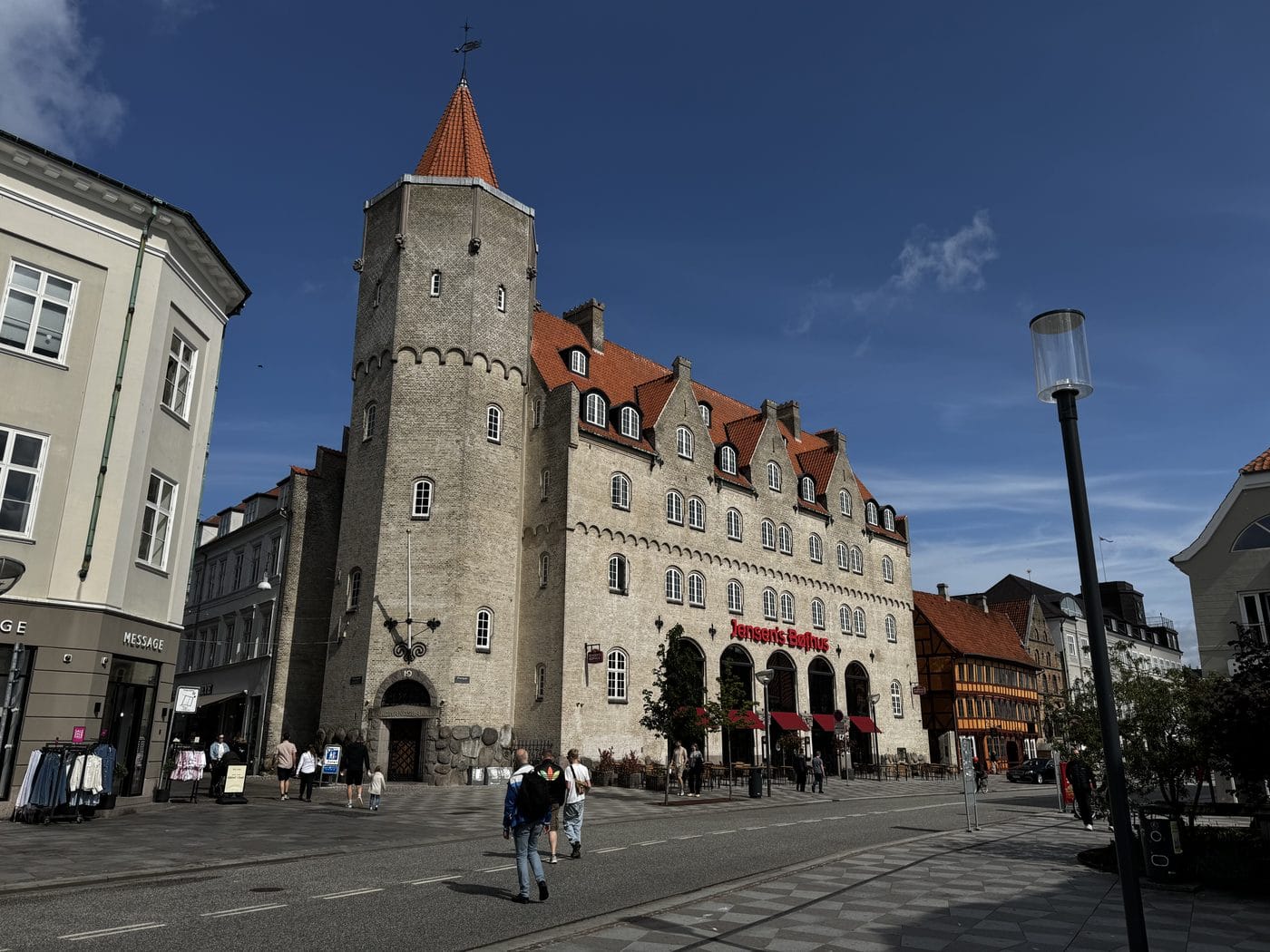 Jens Bangs Stenhus, Aalborg — a 1624 Danish renaissance merchant house with red roof and stone tower