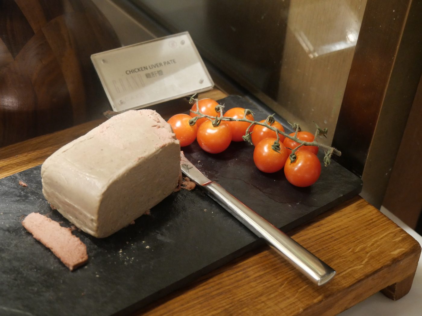 Leverpostej — Danish liver pâté served with toast and pickled garnish