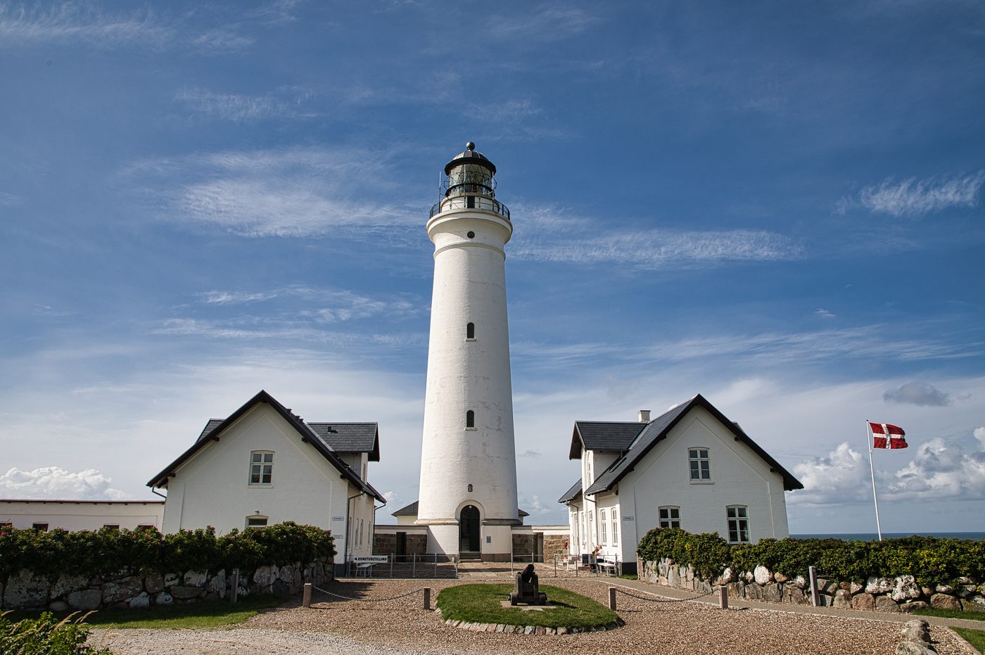 Hirtshals lighthouse, white tower against grey north Jutland sky