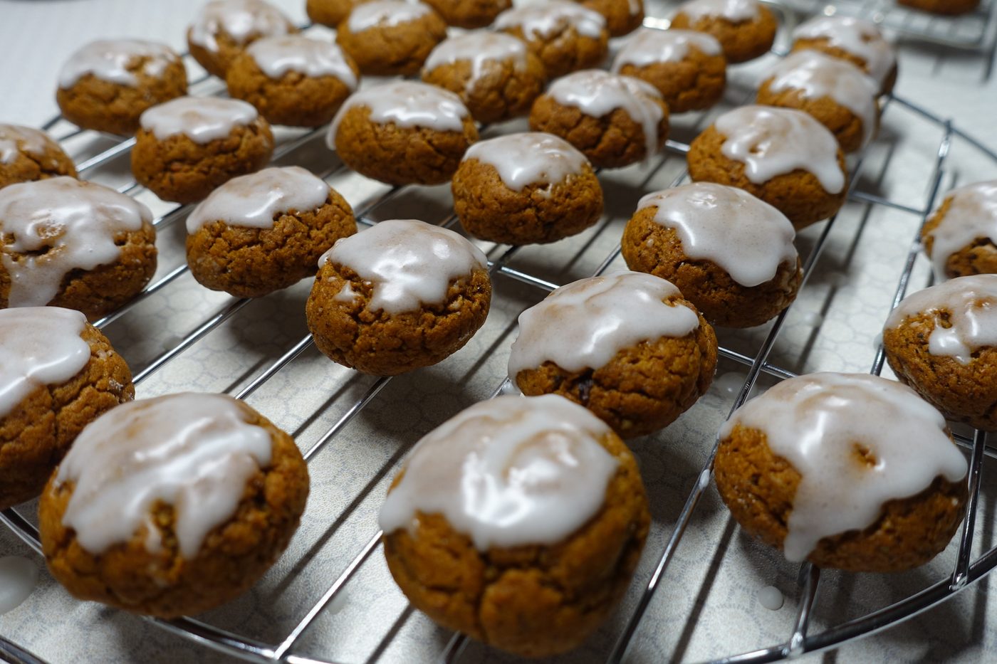 A wooden tray of home-baked pebernødder — small Danish Christmas spice biscuits